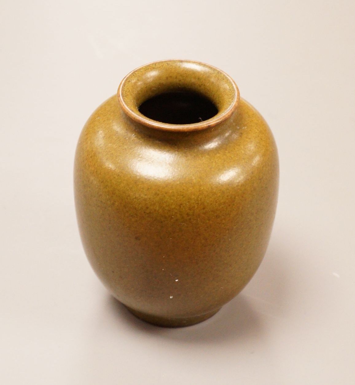 A Chinese miniature tea dust glazed jar, height 5.5cm